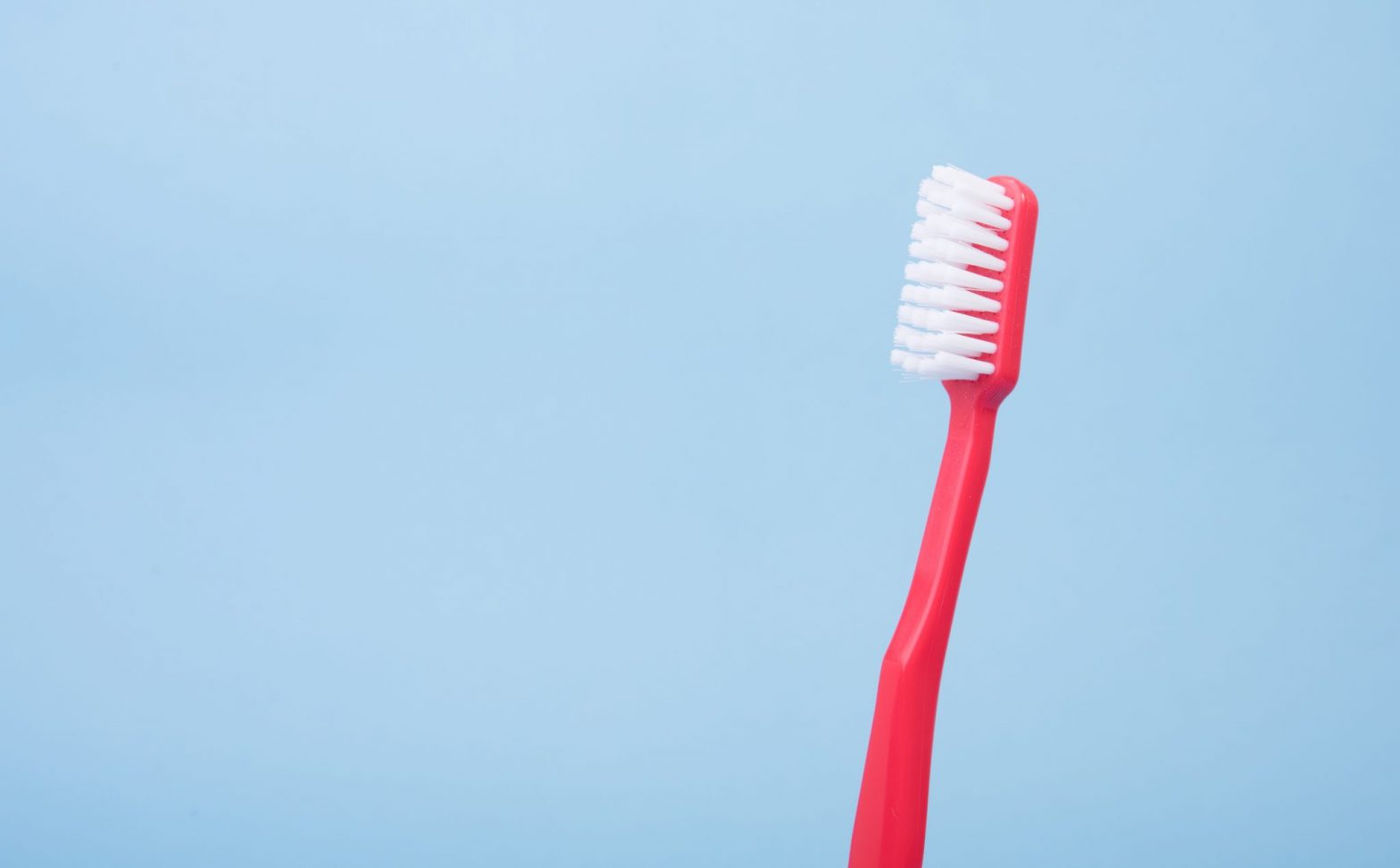 red tooth brush
